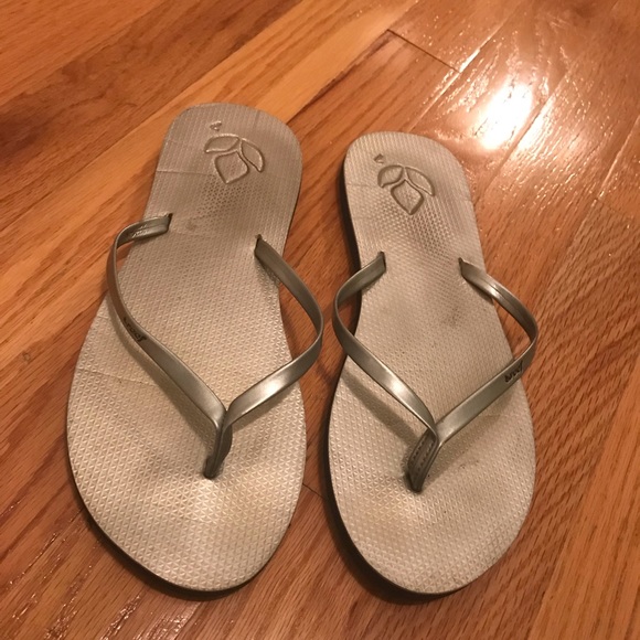 reef silver flip flops